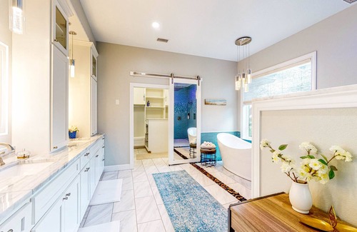 Waller House | Custom Home with Guesthouse, Pond, Swimming Deck, Beach & Tropical Bar