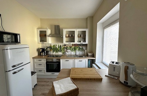 Dahlen Apartment | Dahlen vacation apartment with family-friendly garden