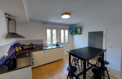 Siegen Apartment | Das Alte Kutscherhaus -table View 1C