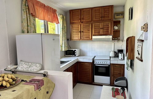 Pereybere Apartment | Delightful apartment with pool, 3 minutes walk to beaches, restaurants & shops.