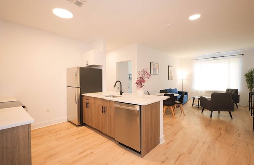 Downtown Apartment | Deluxe 2BR - Parking, Gym, Kids Room, and Wifi