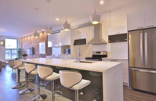 International District Condo | Deluxe 3-bedroom Condo in Old Montreal with a Private terrace