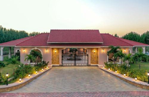 Anjar Villa | Desert Palms by StayVista in Kutch, nestled in orchards, features a swimming pool and a scenic balcony for a serene getaway