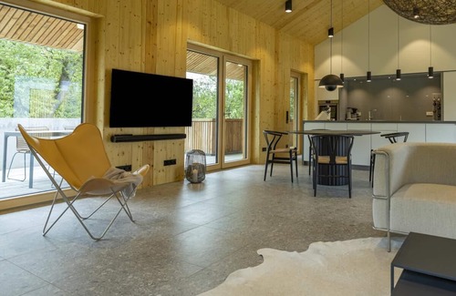 Blaufelden House | Design architect house, large fenced garden, fireplace, Klafs sauna, large windows and courtyard in the countryside