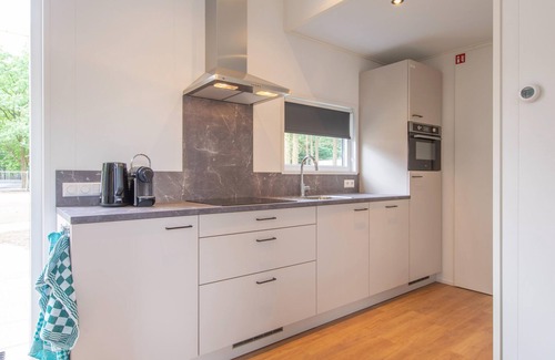 Municipality of Geldrop-Mierlo Ski Chalet | Detached chalet with air conditioning, on a holiday park, 12 km. from Eindhoven