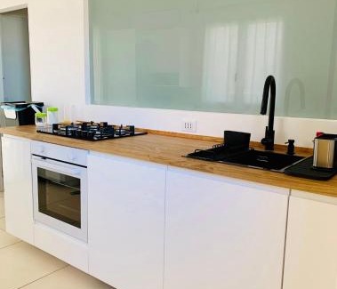 Scoglitti Apartment | DIECI E modern sea apartment