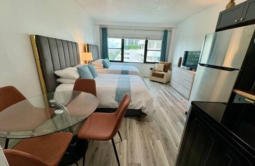 Mid Beach Condo | Directly on the Beach - Pool & Ocean access