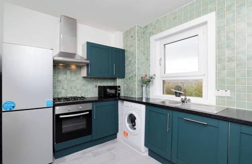 Dunfermline Apartment | Discover comfort at our 2-bedroom home in Dunfermline, offering 3 beds for a relaxing stay
