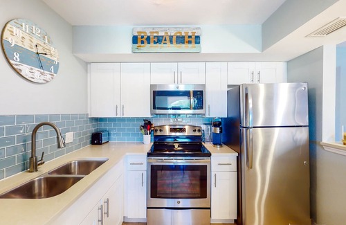 North Redington Beach Condo | Dog-friendly condo with pool, fitness area, balcony, fast WiFi, & W/D