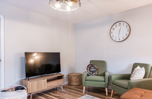 New Albany House | Dog-friendly 1920s charmer with bohemian finishes, firepit, central air, and W/D