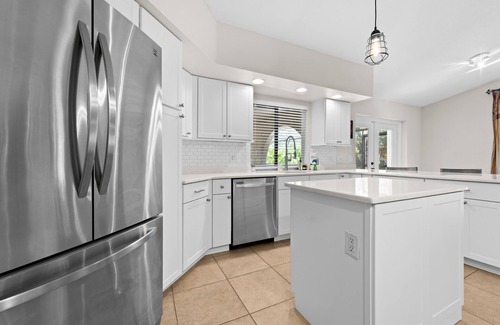 Burnt Store Isles House | Dog-Friendly Canal-Front Home with Heated Pool, Dock, Screened Lanai & Free WiFi