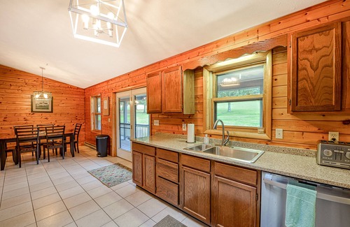 McHenry Cabin | Dog-friendly home with private pond, wraparound porch & fireplaces