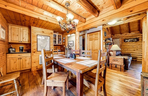 Cresco Cabin | Dog-friendly log cabin with great outdoor bar, firepit, fireplace & porches