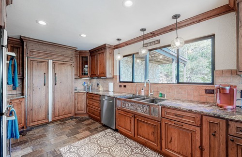 Point Pedernales House | Dog-friendly riverfront home with dock, private hot tub, game room, amazing view