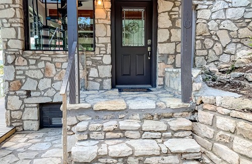 Point Pedernales House | Dog-friendly riverfront home with dock, private hot tub, game room, amazing view