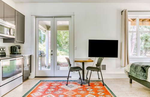 Stevenson House | Dog-friendly studio with river view, patio, grill, & shared W/D