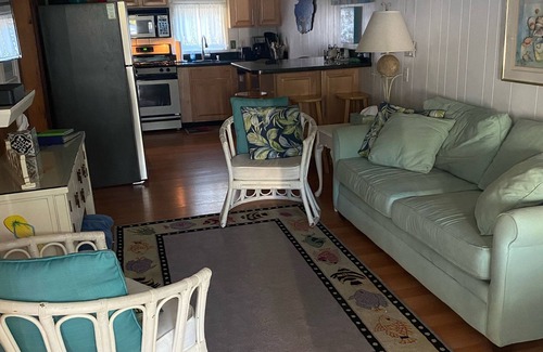 Rehoboth by the Sea Cottage | Dog-friendly Vintage Dewey Beach Cottage - just 110 steps from beach!