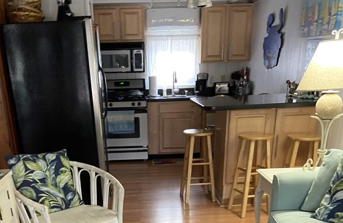 Rehoboth by the Sea Cottage | Dog-friendly Vintage Dewey Beach Cottage - just 110 steps from beach!