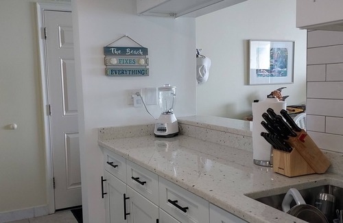East Wind South Condo | Dolphin View-oceanfront condo with large balcony overlooking no drive beach.