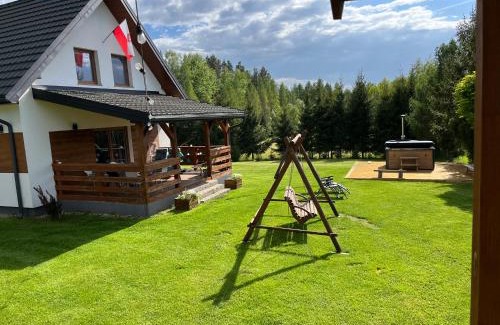 Sejny House | Domek z kominkiem nad jeziorem z jacuzzi ogrodowym