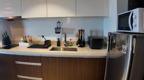 Maribago Apartment | Dominiks nature and silent Jungle Studio Epic Ocean View Tambuli Mactan Pool Beach High Floor