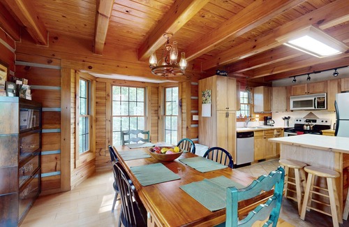 Marshall Cabin | Doolittle mountain cabin with hot tub, firepit & river views | near Asheville
