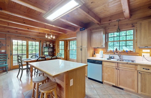 Marshall Cabin | Doolittle mountain cabin with hot tub, firepit & river views | near Asheville