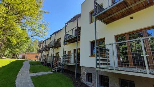 Miedzychod Hotel | Dormowo 34 Apartamenty nad jeziorem