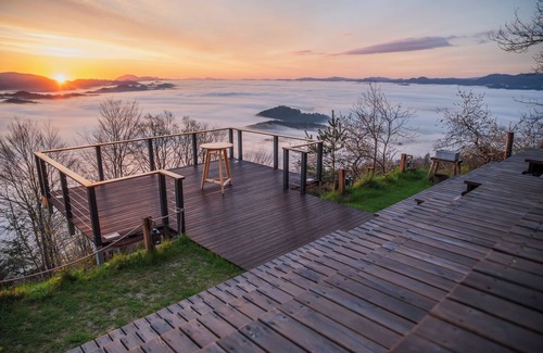 Celje Bed & Breakfast | Double bedroom with balcony and idyllic view surrounded by nature