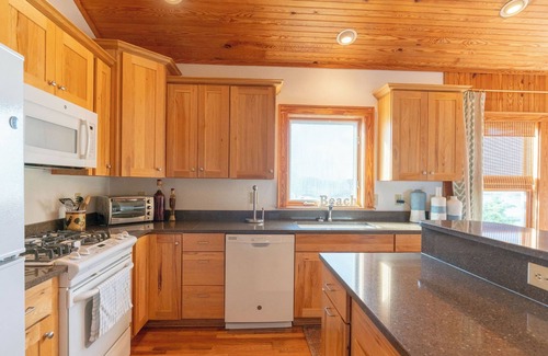 Ocracoke Condo | Down Creek Condo 102: Luxurious, reverse floor plan, in the Village.