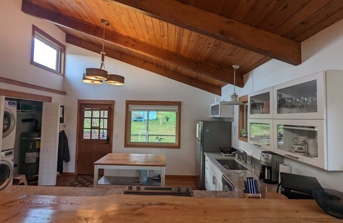Freeland House | Downtown retreat with hot tub, & beach steps away