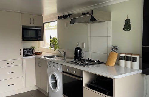 Mount Maunganui Apartment | Downtown the Mount - Walk to the beach, harbour, shops and restaurants!