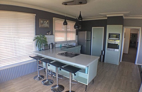 Mount Ousley House | Drift - Artistic retro beach inspired house