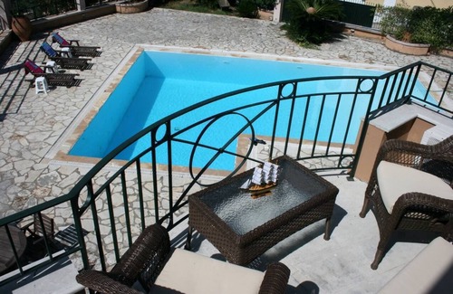 Perama Villa | Durrell Corfu Strawberry-pink Villa