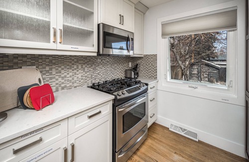 Southwest Calgary House | E@HOME Entire house 5BR2BA&Central by chinook mall