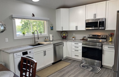 Bumpass Cottage | Eagle's Nest Cottage Fully Renovated 200' Waterfront, In Cove, Dock & More!