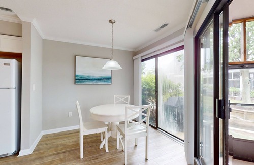 Fenwick Island Condo | East of Sun condo with water-view, on-site pool & tennis - near beach