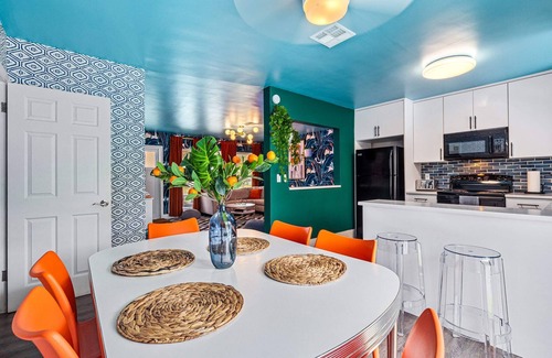 Garden Isles House | Eccentric home with pool, tiki hut & outdoor kitchen