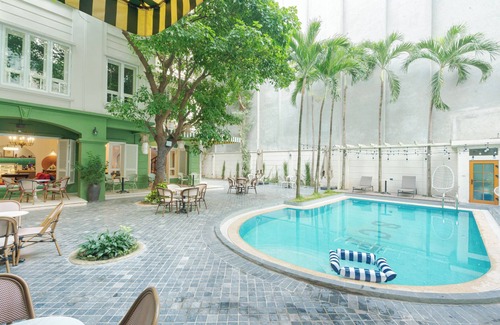 Ba Dinh House | Éclectique is a home layered with stories, culture, and quiet beauty.