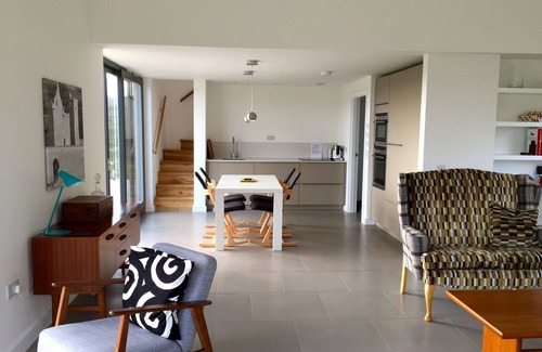 Skinidin House | Eco and back friendly modern house, amazing views from all rooms, by Dunvegan