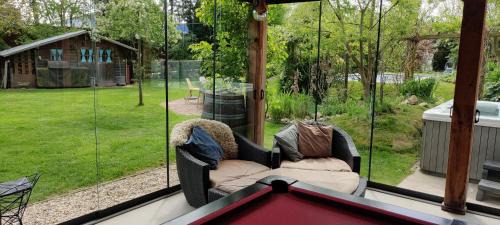 Tilburg House | Ecolodge Tilburg met zwembad in groene oase bij centrum
