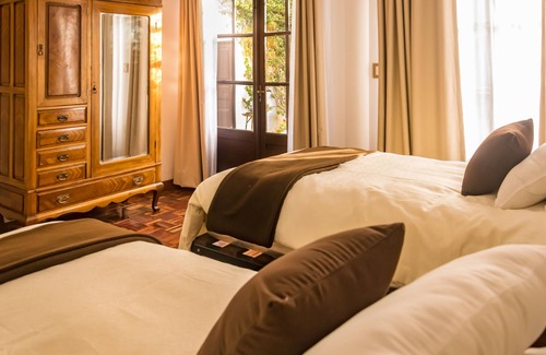 Sucre Bed & Breakfast | El Jardin De Su Merced B&B