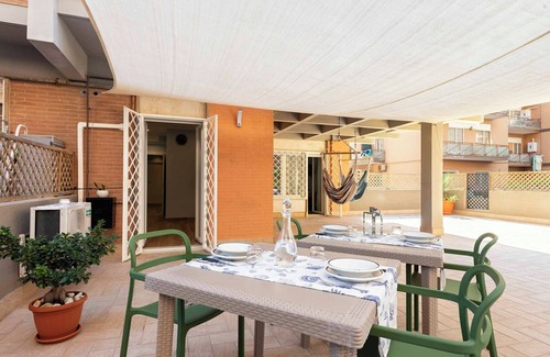 Quartiere XXXIII Lido di Ostia Ponente Apartment | Elegance and Comfort: Spacious House with Patio and 3 Bathrooms