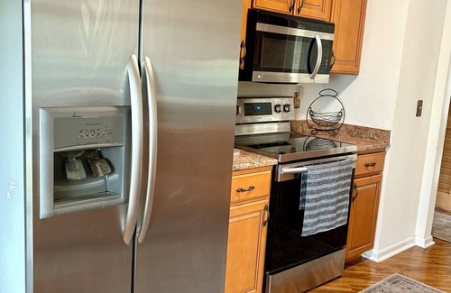 Plantations East Condo | Elegant 3-Bedroom Condo in Lewes with Pond Views