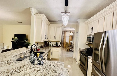 Port Malabar Villa | Elegant and Spacious 4 bed 3 bath Palm Bay Home