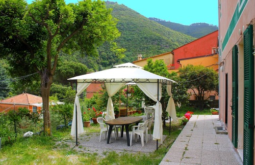 Deiva Marina Apartment | Elegant apartment with garden and private parking 800 meters from the sea