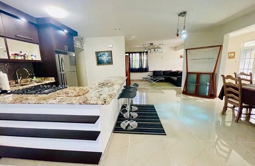 Bejucos House | Elegant Home with Pool and within 10 mins to beach, Airport, and Dining