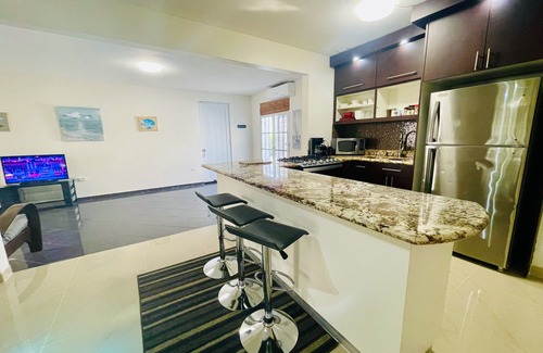 Bejucos House | Elegant Home with Pool and within 10 mins to beach, Airport, and Dining