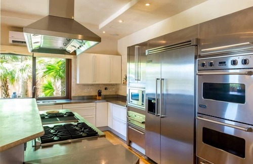 Playa Flamingo House | Elegant Mediterranean-Style Mansion with Beachfront Views and Private Infinity P