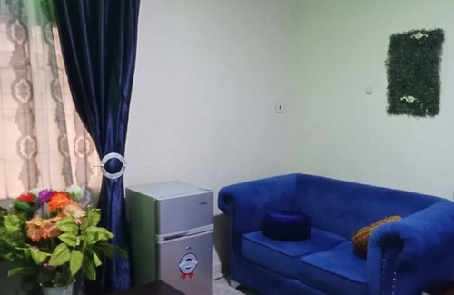 Alimosho Apartment | Elegant Sitting room and Bedroom with AC in vibrant Lagos, Nigeria